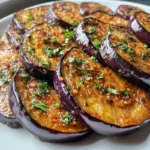 "Purple eggplant sliced and ready for keto cooking" "Low-carb eggplant lasagna recipe" "Grilled eggplant paired with keto-friendly chicken" "Nutritional benefits of purple eggplant for keto diets"